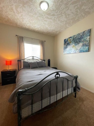 5069 Cornerstone, High Prairie, AB - Indoor Photo Showing Bedroom