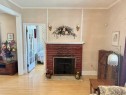 103 Centre Street, Mclennan, AB  - Indoor Photo Showing Living Room With Fireplace 