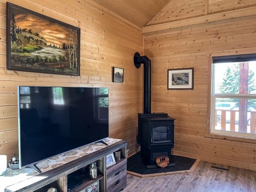 20133 Twp Rd 832, St. Isidore, AB - Indoor Photo Showing Other Room With Fireplace