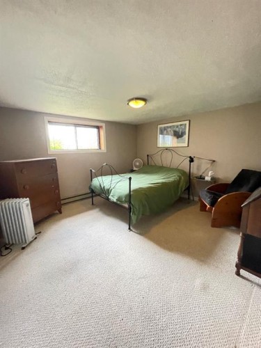 75 Peace River Avenue, Joussard, AB - Indoor Photo Showing Bedroom