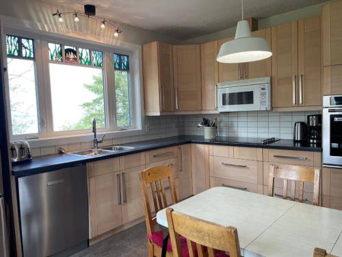 75 Peace River Avenue, Joussard, AB - Indoor Photo Showing Kitchen With Double Sink