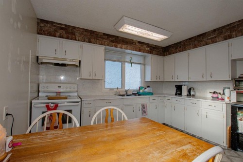 9227 107 Avenue, Grande Prairie, AB - Indoor Photo Showing Kitchen With Double Sink