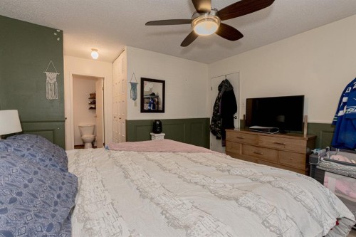 9227 107 Avenue, Grande Prairie, AB - Indoor Photo Showing Bedroom