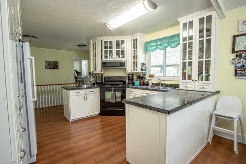 110035 Range Road 183, Rural Mackenzie County, AB - Indoor Photo Showing Kitchen With Double Sink