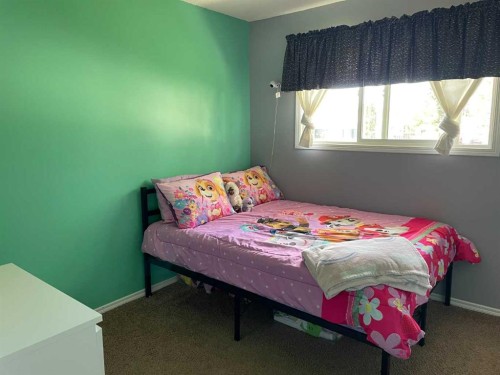 10605 107 Street Close, Fairview, AB - Indoor Photo Showing Bedroom