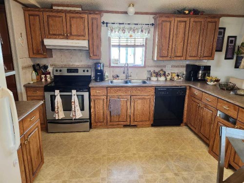46 5812 Street Nw, High Prairie, AB - Indoor Photo Showing Kitchen With Double Sink