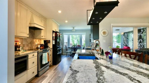 10501 83 Street, Peace River, AB - Indoor Photo Showing Kitchen With Double Sink With Upgraded Kitchen