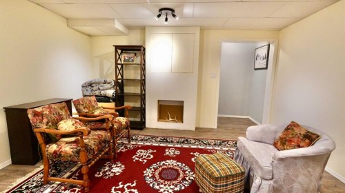 10501 83 Street, Peace River, AB - Indoor With Fireplace