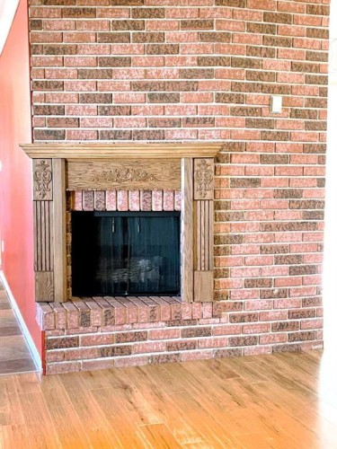 10409 115 Street, Fairview, AB - Indoor Photo Showing Living Room With Fireplace