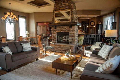 13 Chinook Crescent, High Level, AB - Indoor Photo Showing Living Room With Fireplace