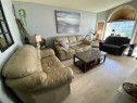 7607 Michealis Boulevard, Grande Prairie, AB  - Indoor Photo Showing Living Room 