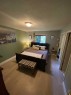 7607 Michealis Boulevard, Grande Prairie, AB  - Indoor Photo Showing Bedroom 