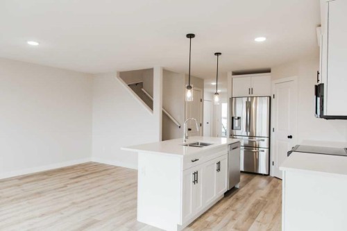 9560 114 Avenue, Clairmont, AB - Indoor Photo Showing Kitchen With Double Sink With Upgraded Kitchen