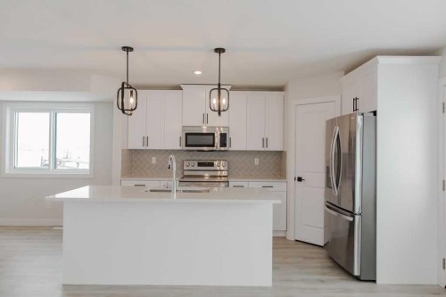 9554 114 Avenue, Clairmont, AB - Indoor Photo Showing Kitchen With Stainless Steel Kitchen With Upgraded Kitchen