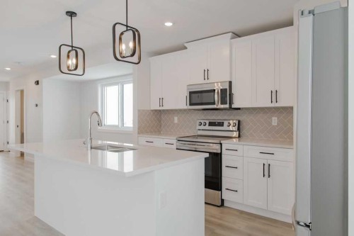 9554 114 Avenue, Clairmont, AB - Indoor Photo Showing Kitchen With Upgraded Kitchen