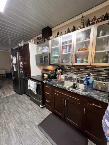 - Nw 32-70-9-W6, Beaverlodge, AB 