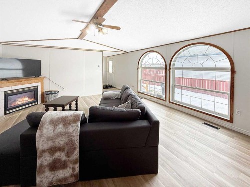 5206 52 Avenue, Valleyview, AB - Indoor Photo Showing Living Room With Fireplace