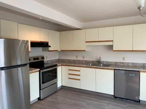8420 99 Avenue, Peace River, AB - Indoor Photo Showing Kitchen With Double Sink