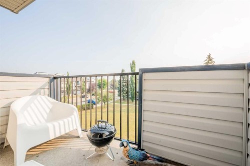 1212-7201 Poplar Drive, Grande Prairie, AB - Outdoor With Exterior