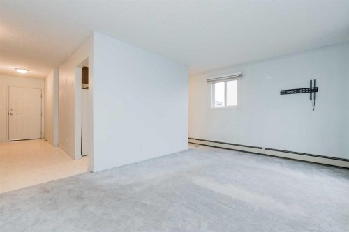1212-7201 Poplar Drive, Grande Prairie, AB - Indoor Photo Showing Other Room