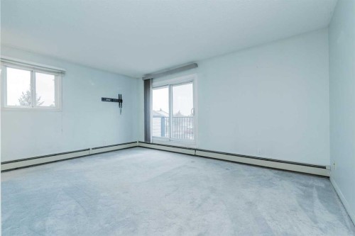 1212-7201 Poplar Drive, Grande Prairie, AB - Indoor Photo Showing Other Room