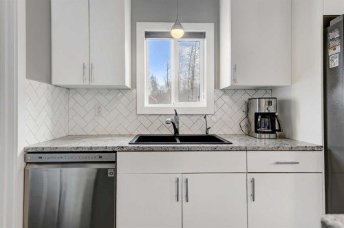 722003 Range Road 91, Rural Grande Prairie No. 1, County Of, AB - Indoor Photo Showing Kitchen With Double Sink