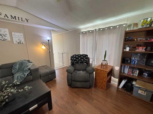 9702 108A Avenue, Clairmont, AB - Indoor Photo Showing Living Room