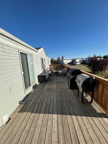 9702 108A Avenue, Clairmont, AB - Outdoor With Deck Patio Veranda With Exterior