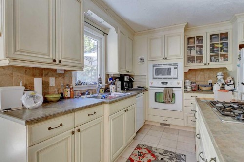 713062 Range Road 94, Beaverlodge, AB - Indoor Photo Showing Kitchen With Double Sink