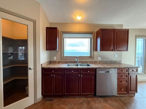 81 Peace River Avenue, Joussard, AB - Indoor Photo Showing Kitchen With Double Sink