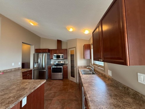 81 Peace River Avenue, Joussard, AB - Indoor Photo Showing Kitchen With Double Sink