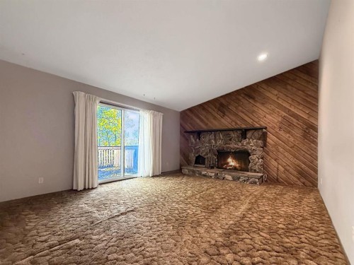9802 110 Street, Grande Cache, AB - Indoor With Fireplace
