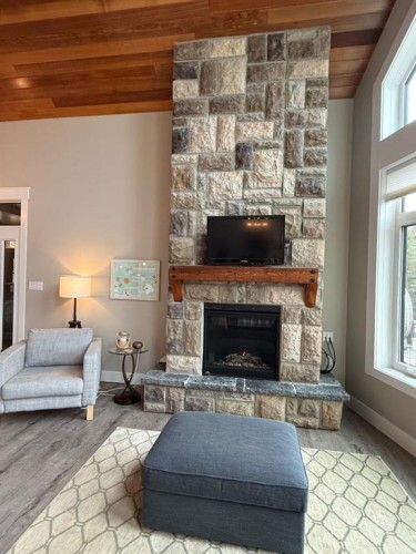 7-13417 Twp Rd 752A, High Prairie, AB - Indoor Photo Showing Living Room With Fireplace