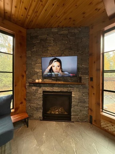 7-13417 Twp Rd 752A, High Prairie, AB - Indoor Photo Showing Living Room With Fireplace