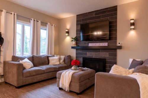 10207 126 Avenue, Grande Prairie, AB - Indoor Photo Showing Living Room With Fireplace