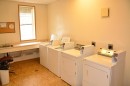 101-215-10118 100 Avenue, Peace River, AB  - Indoor Photo Showing Laundry Room 