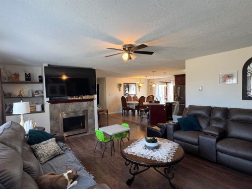 11632 120 Avenue Close, Fairview, AB - Indoor Photo Showing Living Room With Fireplace