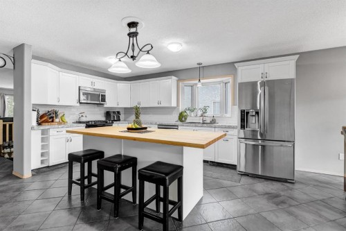 10659 81 Avenue, Grande Prairie, AB - Indoor Photo Showing Kitchen With Stainless Steel Kitchen With Upgraded Kitchen