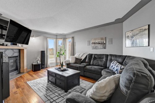 10659 81 Avenue, Grande Prairie, AB - Indoor Photo Showing Living Room With Fireplace