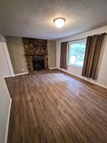 214 7 Street, Beaverlodge, AB - Indoor With Fireplace