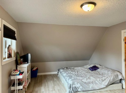 125 Monias Drive, Rural Big Lakes County, AB - Indoor Photo Showing Bedroom