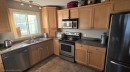 10905 91 Street, Peace River, AB  - Indoor Photo Showing Kitchen With Double Sink 