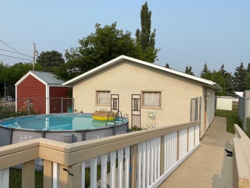 4910 53 Street, Grimshaw, AB - Outdoor With Above Ground Pool With Exterior