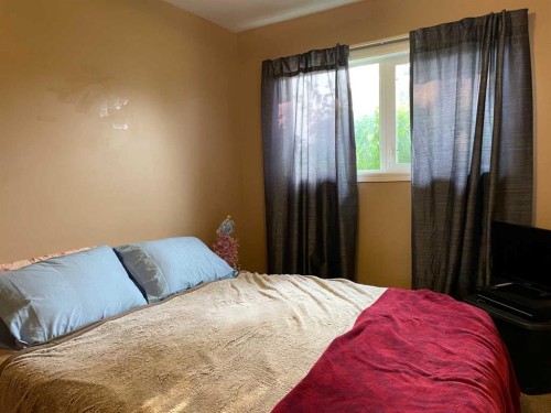 4910 53 Street, Grimshaw, AB - Indoor Photo Showing Bedroom
