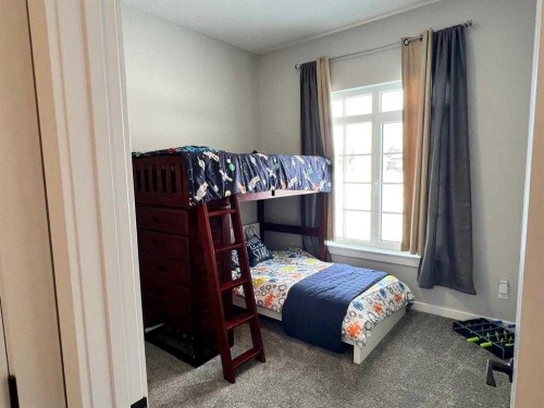 11-1049 Alberta Avenue, Debolt, AB - Indoor Photo Showing Bedroom