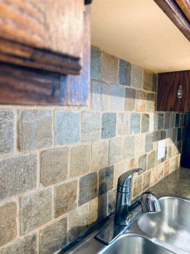 7421 98B Street, Peace River, AB - Indoor Photo Showing Kitchen With Double Sink