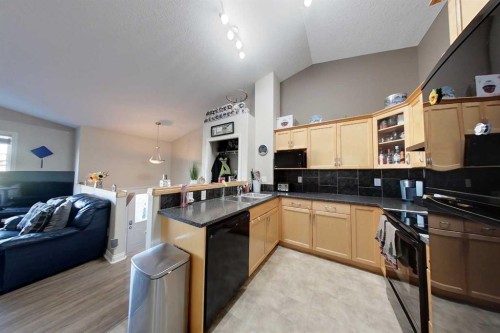 12026 102A Street, Grande Prairie, AB - Indoor Photo Showing Kitchen With Double Sink