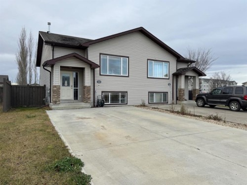 12026 102A Street, Grande Prairie, AB - Outdoor With Facade