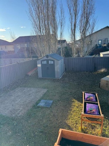 12026 102A Street, Grande Prairie, AB - Outdoor With Backyard
