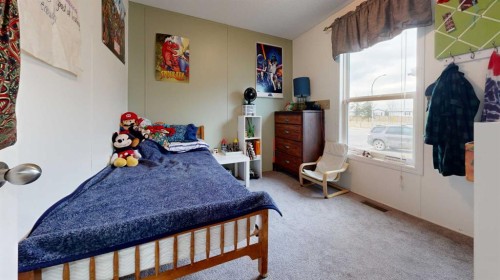 8810 90 Street, Grande Prairie, AB - Indoor Photo Showing Bedroom